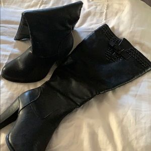 Black knee-high studded leather boots